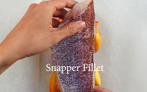 King-Snapper-Fillet-Baked A chef prepares to bake a King Snapper fillet