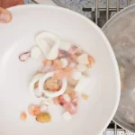 Seafood Medley is blanched and removed from the water